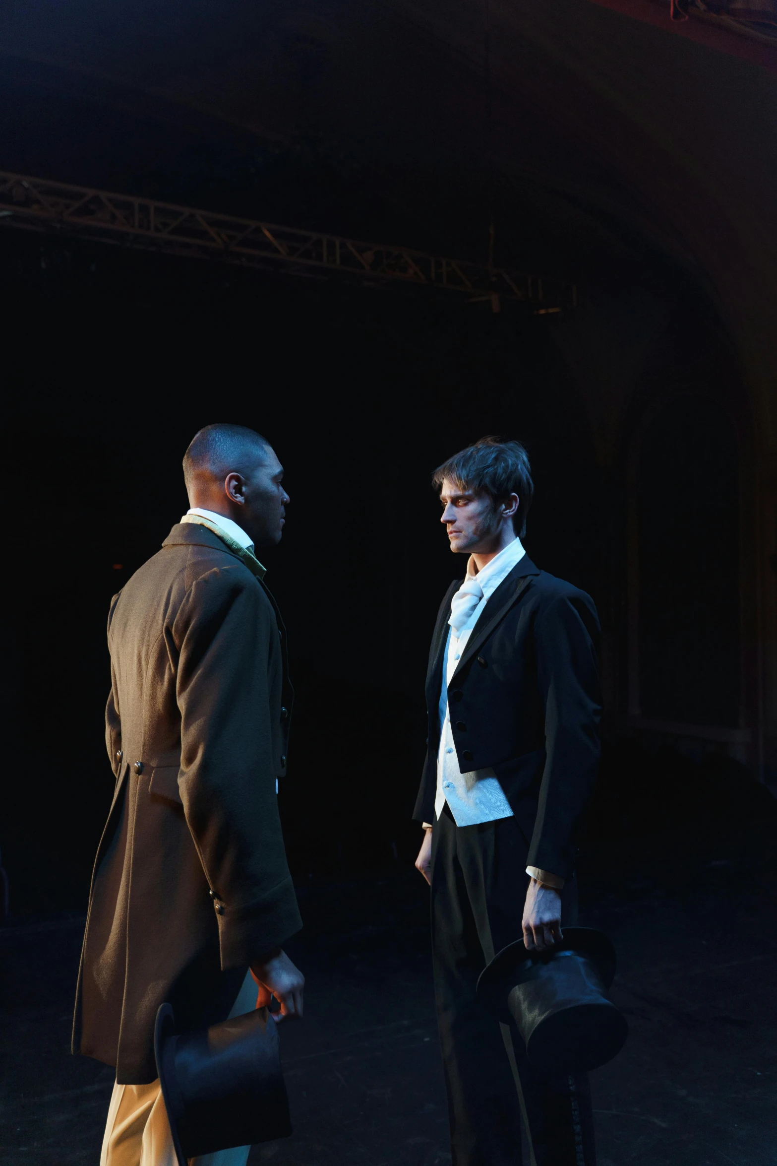 a couple of men standing next to each other on a stage, inspired by Gawen Hamilton, unsplash, renaissance, facing each other, black man, ( ( theatrical ) ), slide show