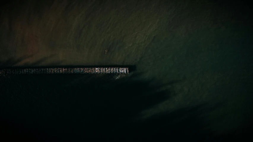 a boat floating on top of a body of water, inspired by Andreas Gursky, unsplash contest winner, dark palette, ignant, small dock, aerial