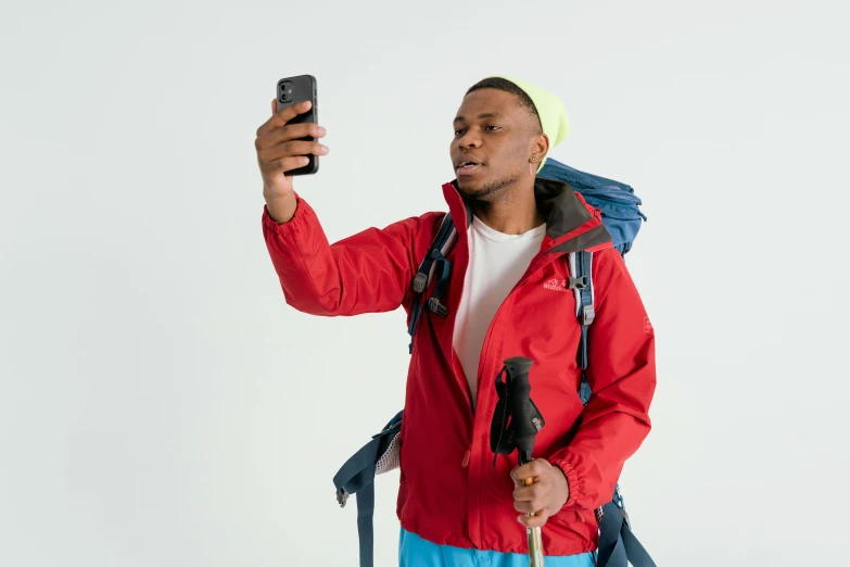 a man taking a selfie with his cell phone, trending on pexels, visual art, red sport clothing, avatar image, trecking, kano)