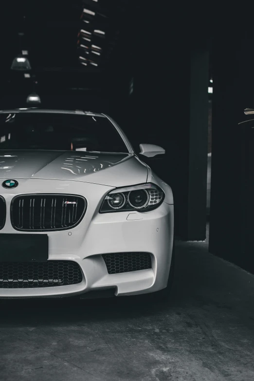 a white bmw car parked in a garage, pexels contest winner, 15081959 21121991 01012000 4k, intense expression, chrome and carbon, instagram picture