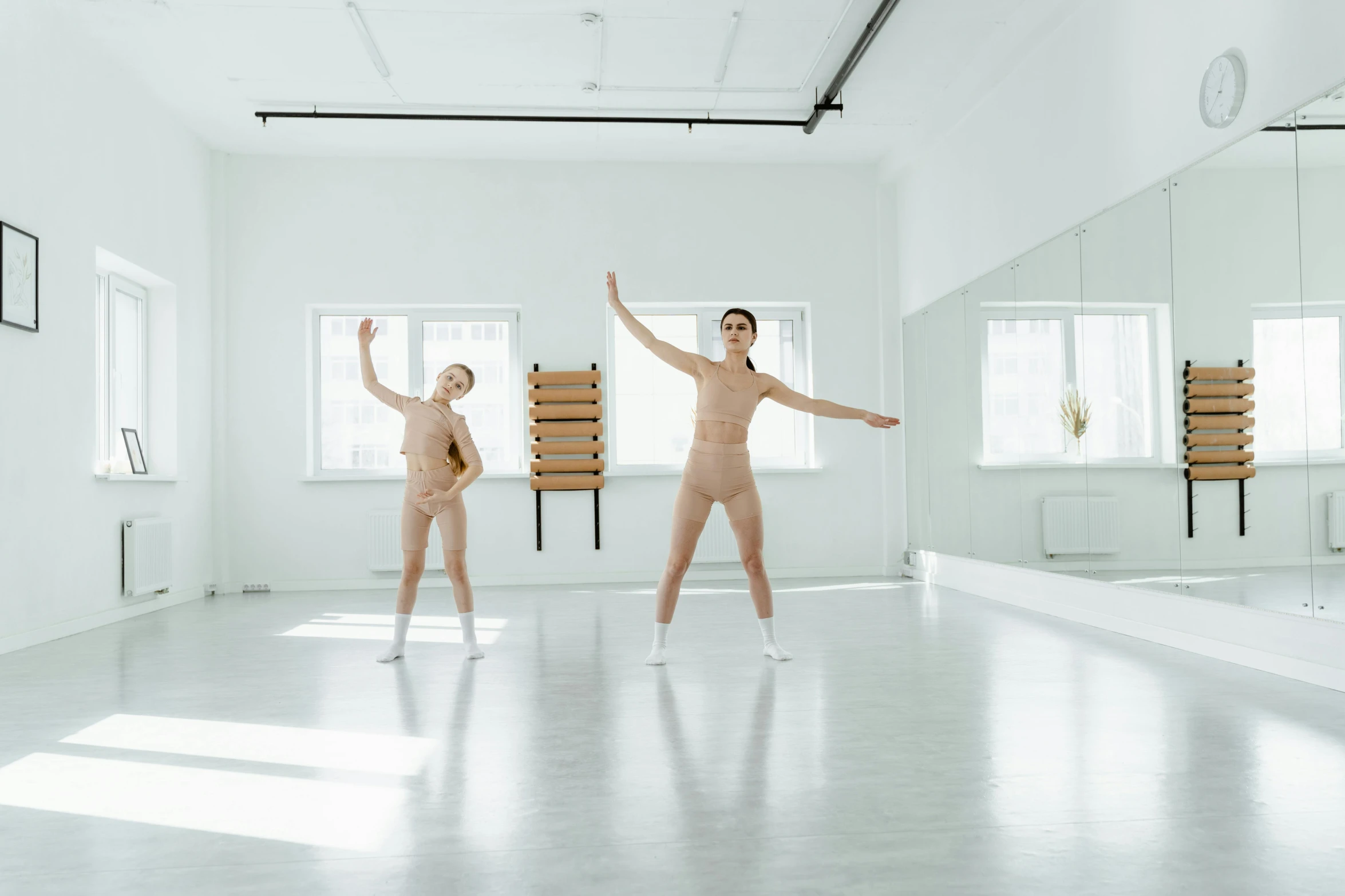a couple of people that are standing in a room, arabesque, showstudio, female forms, andrea savchenko, production photo