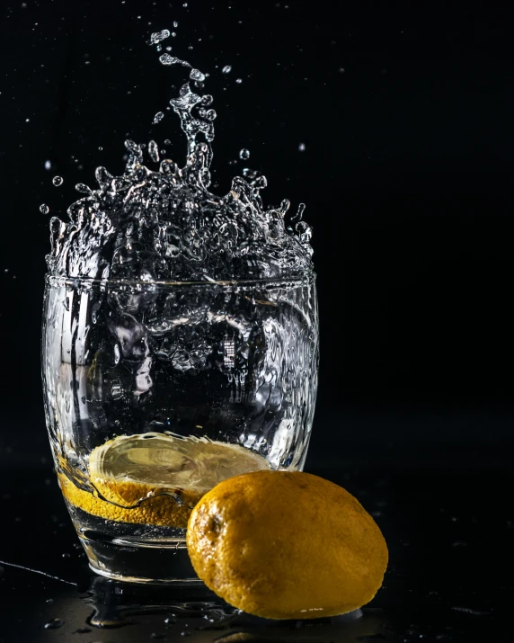 a lemon being dropped into a glass of water, by Niko Henrichon, pexels contest winner, square, promo image, today\'s featured photograph 4k, face shot