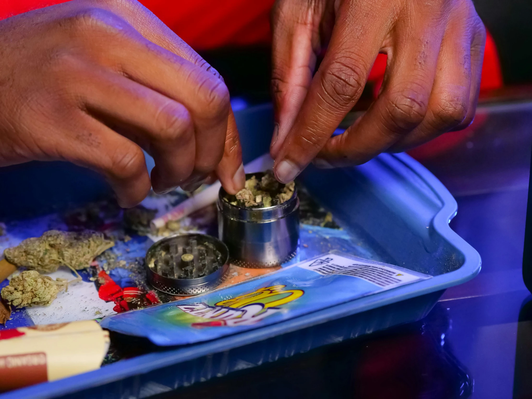 a close up of a tray of food on a table, process art, smoking a weed with snoop dogg!!, hands on counter, thumbnail, grind