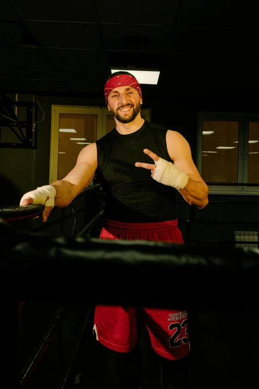 a man posing for a picture in a boxing ring, rugged man portrait, high-res, lindsay adler, digital photo