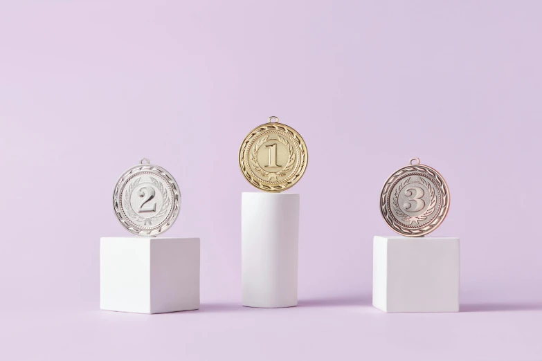 three gold, silver and bronze medals on pedestals, trending on pexels, renaissance, textured base ; product photos, pastel', tabletop game props, silver，ivory