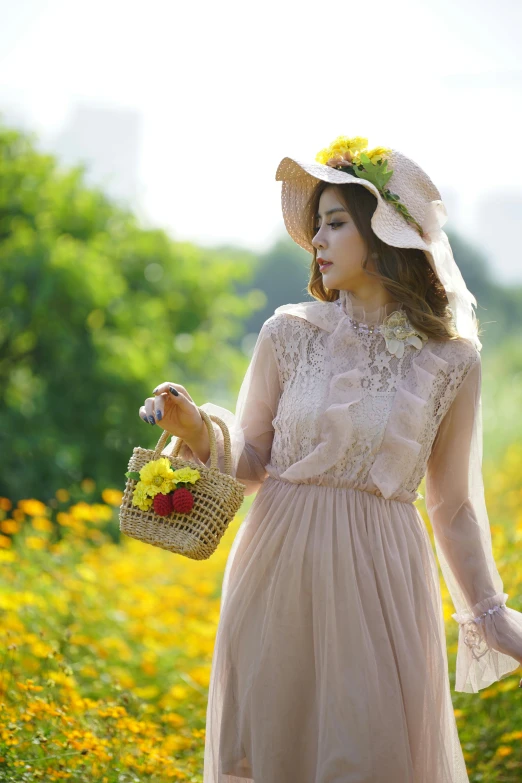 a woman holding a basket of flowers in a field, inspired by Oleg Oprisco, pixabay contest winner, ao dai, with straw hat, parks and gardens, 👰 🏇 ❌ 🍃