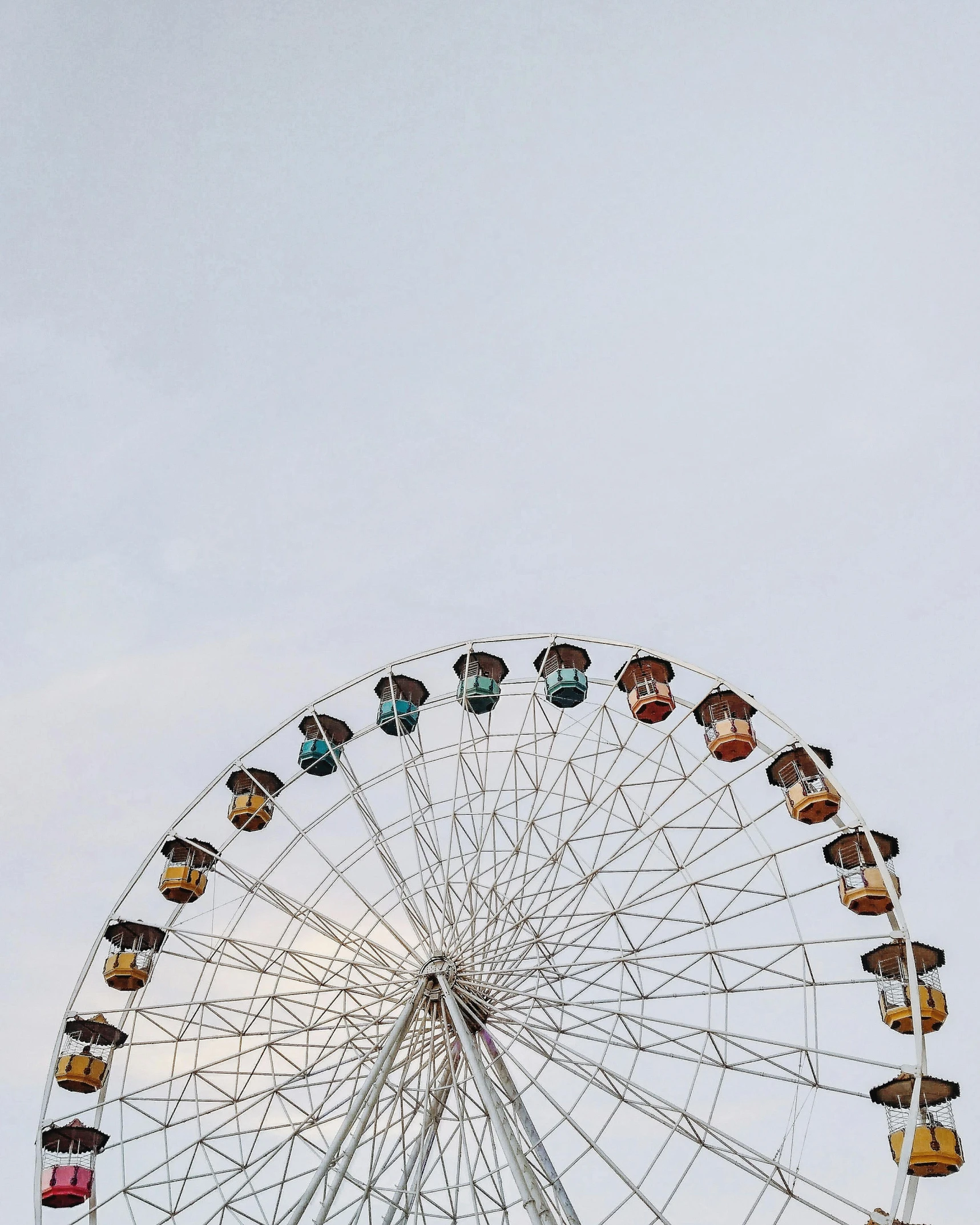 a ferris wheel in front of a cloudy sky, pexels contest winner, aestheticism, instagram story, pastel sky, fair skin, kodak photo