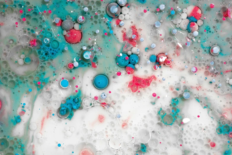 a bath tub filled with lots of blue and pink bubbles, a microscopic photo, inspired by Howardena Pindell, teal silver red, detailed product shot, kek, abstract white fluid