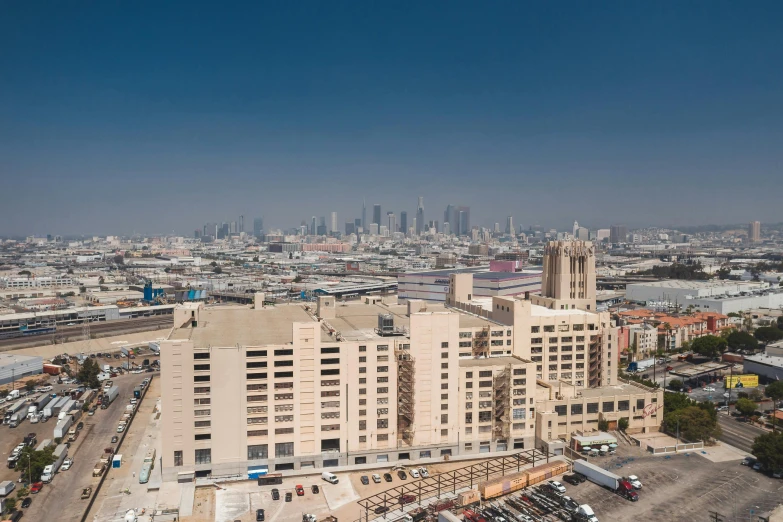 a view of a city from the top of a building, inspired by Victor Enrich, unsplash, renaissance, 1600 south azusa avenue, “wide shot, brown, high resolution photograph