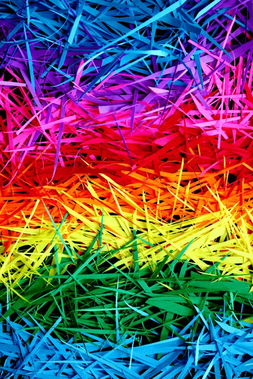 a close up of a rainbow colored grass, fibres trial on the floor, colorsmoke, pride, 2 5 6 colours