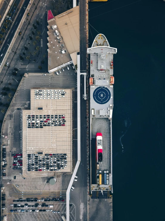 an aerial view of a large ship docked in a harbor, by Sebastian Spreng, pexels contest winner, hurufiyya, helipad, graphic”, high quality image”, canvas