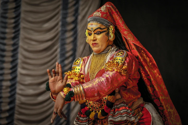 a close up of a person in a costume, a statue, inspired by Raja Ravi Varma, pexels contest winner, theater dance scene, square, puppet, avatar image