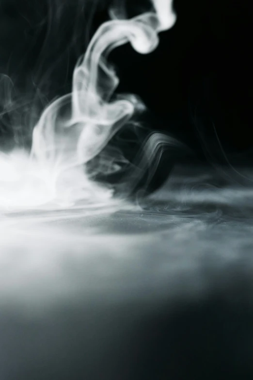 a close up of smoke on a black background, an album cover, by Daniel Seghers, lyrical abstraction, smoke and volumetric fog, ghostly spirits, about to step on you, smoke on the water