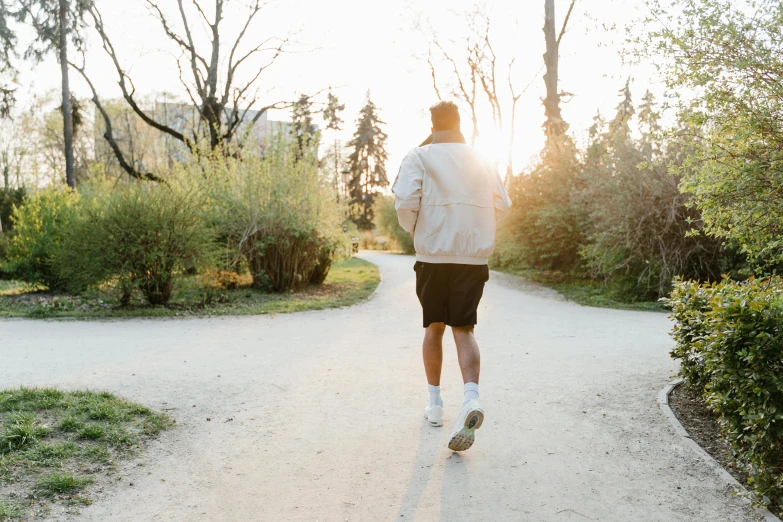 a man running on a path in a park, pexels contest winner, full morning sun, 🚿🗝📝, profile image, streetwear