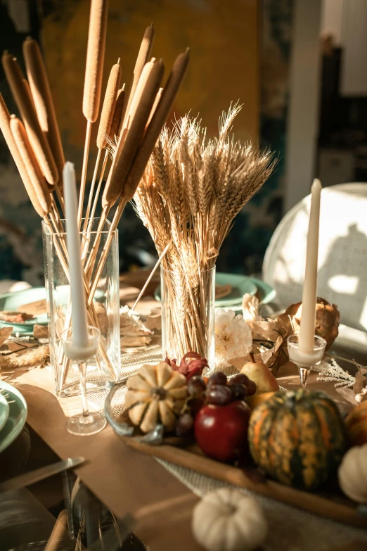 a close up of a plate of food on a table, harvest, glassware, dry grass, indoor setting