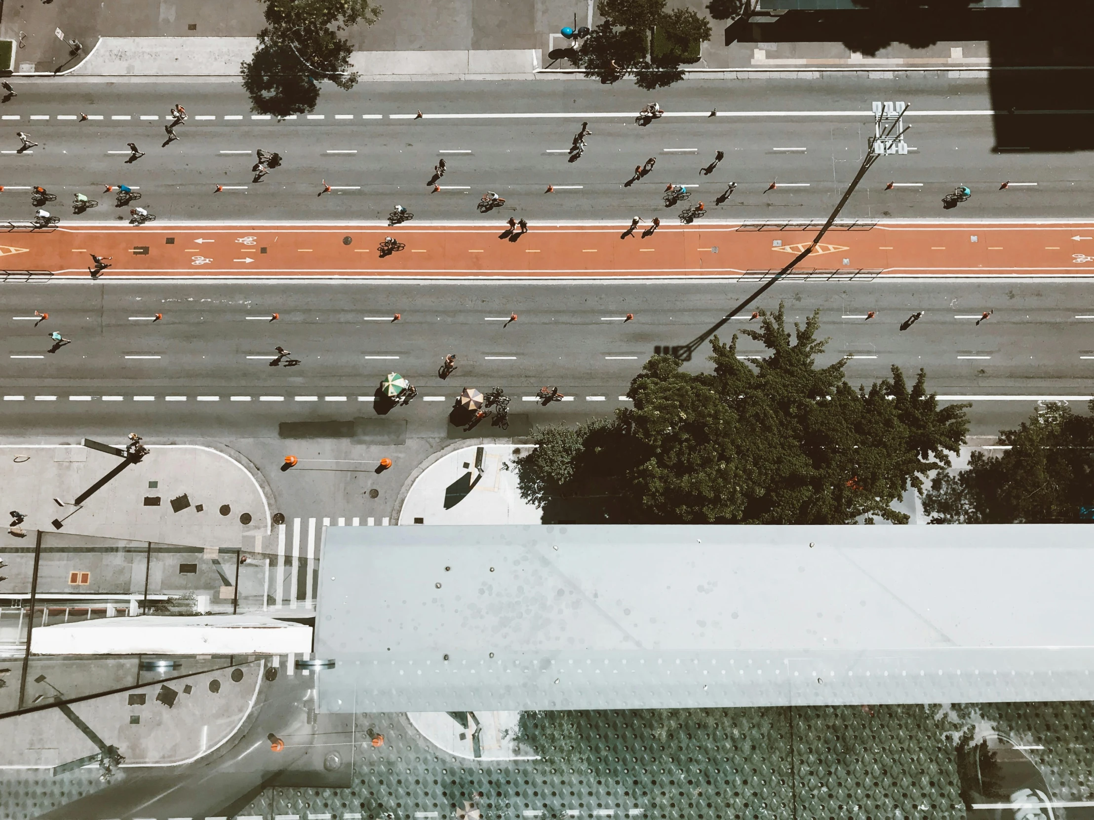 a view of a street from the top of a building, a screenshot, pexels contest winner, crossing road, jovana rikalo, square, high quality upload