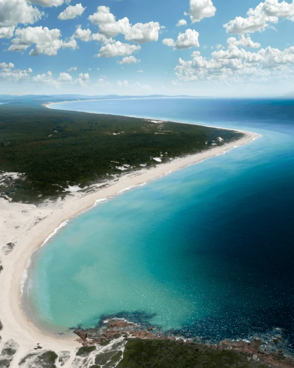 a large body of water next to a sandy beach, by Elizabeth Durack, flickr, wide aerial shot, white sand beach, ignacio fernandez rios ”, viewed from bellow