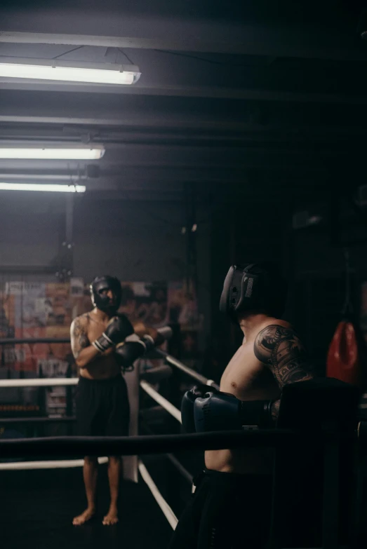 a couple of men standing next to each other in a boxing ring, by Robbie Trevino, happening, faded and dusty, [ theatrical ]