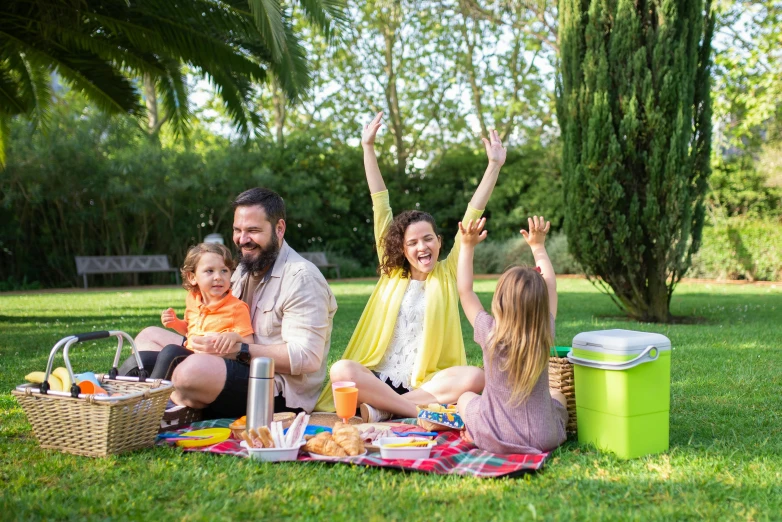 a family having a picnic in the park, a portrait, by Nicolette Macnamara, pexels, figuration libre, lourmarin, excitement, avatar image, promotional image