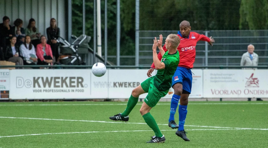 a couple of men playing a game of soccer, a picture, by Jan Tengnagel, pexels, figuration libre, a green, blond, helmond, realistic »