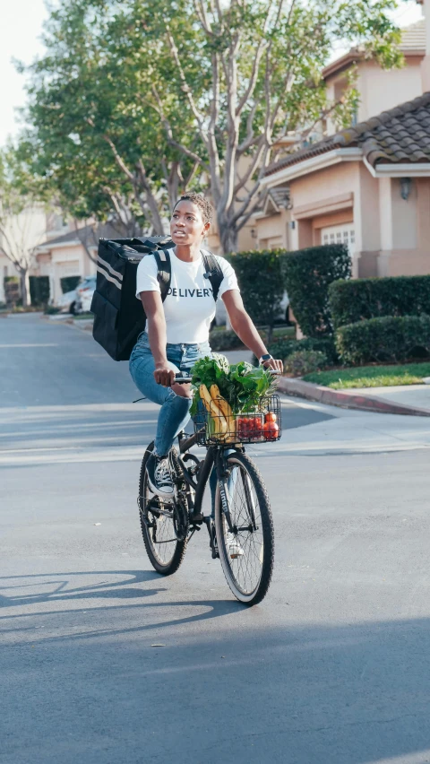 a man riding a bike down a street, getting groceries, black main color, pokimane, full body image