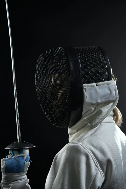 a woman in a fencing suit holding a sword, profile image, tech helmet, photographed for reuters, alessio albi