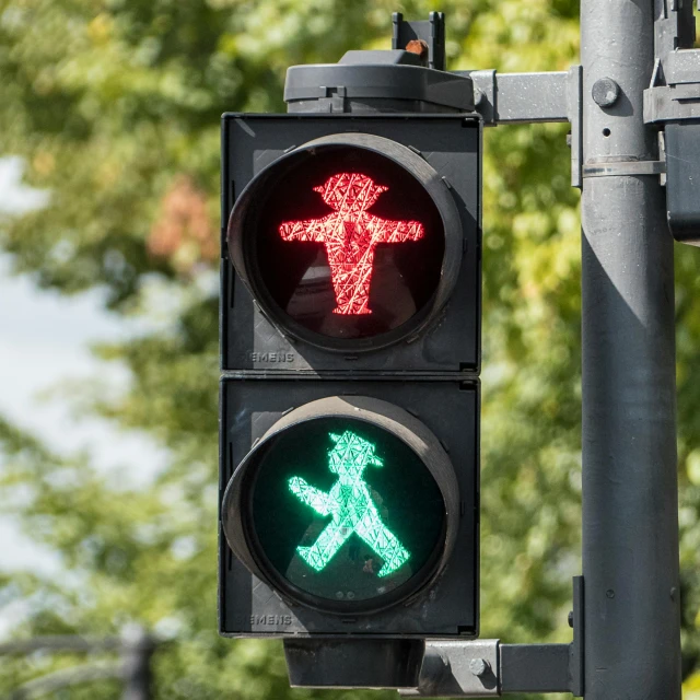 a traffic light with a crosswalk sign on it, by Adam Marczyński, unsplash, visual art, stick figure, red green, toddler, green man