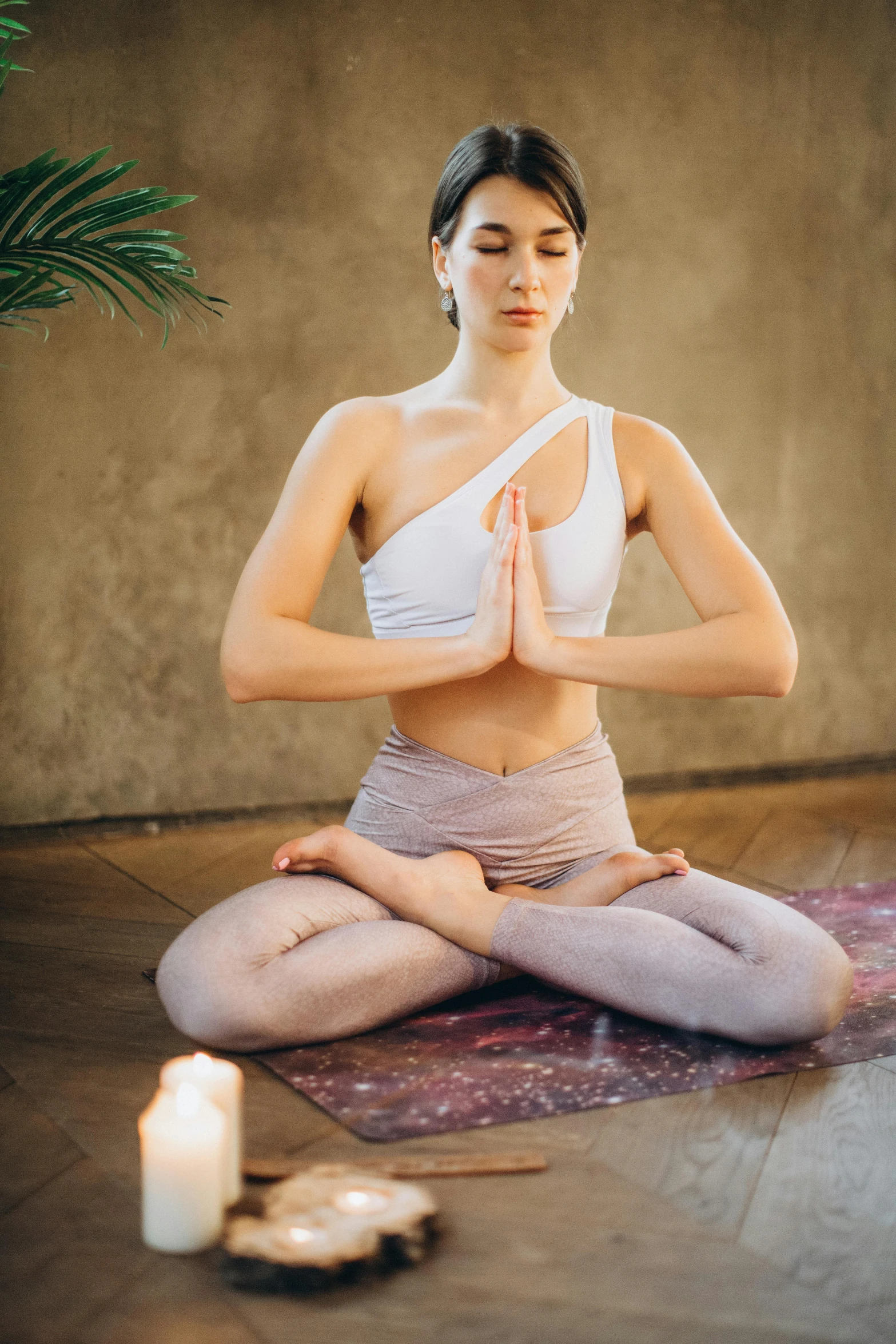 a woman sitting in the middle of a yoga pose, trending on pexels, renaissance, malaysian, square, low quality photo, smooth glowing skin