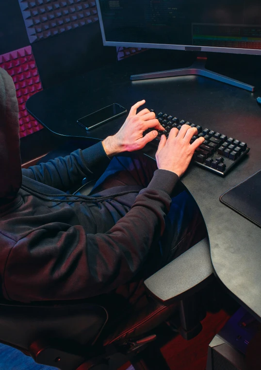 a man sitting at a desk in front of a computer, by Jason Felix, trending on reddit, gamers keyboard, sitting with wrists together, leaked photo, steam workshop