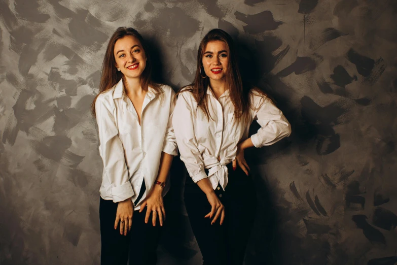 a couple of women standing next to each other, pexels contest winner, antipodeans, wearing a white button up shirt, twins, 15081959 21121991 01012000 4k, brunette