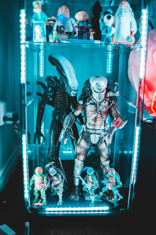 a display case filled with lots of action figures, a hologram, inspired by Noriyoshi Ohrai, pexels contest winner, maximalism, alien vs predator, neon light showing injuries, lifestyle, white xenomorph