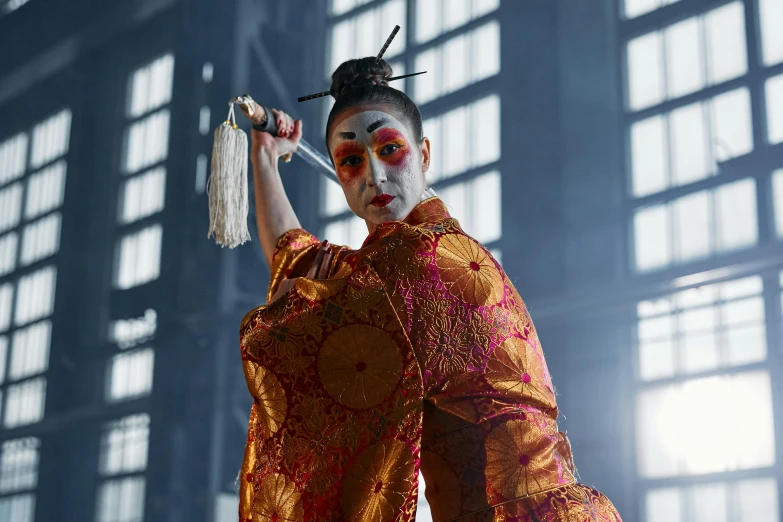 a woman dressed as a geisha holding a sword, pexels contest winner, performing on stage, hito steyerl, press shot, mime