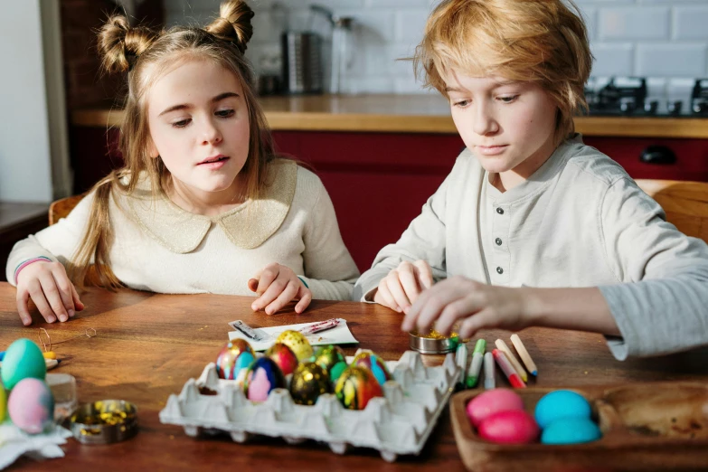 a couple of kids that are sitting at a table, pexels contest winner, arts and crafts movement, eggs, board game, 15081959 21121991 01012000 4k, lachlan bailey