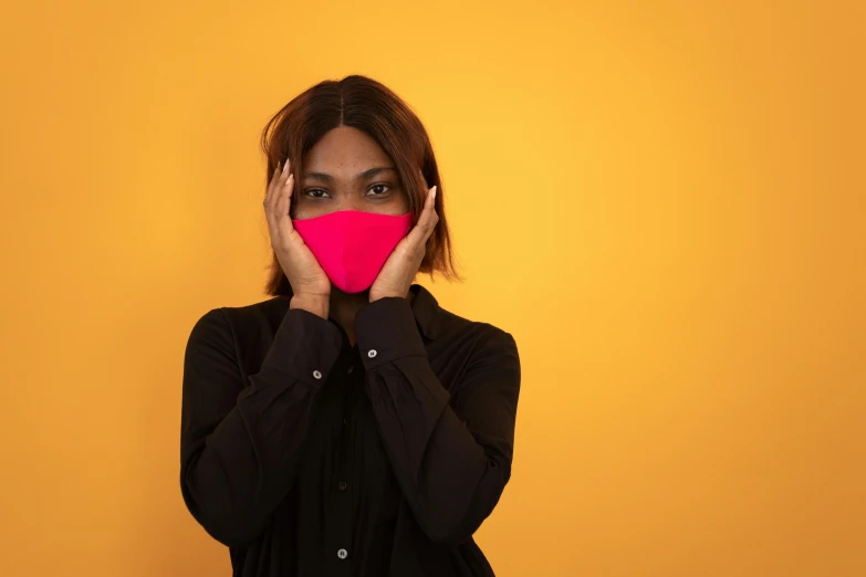 a woman covering her face with a red heart, pexels contest winner, renaissance, neon pink and black color scheme, face mask, magenta shirt, ( ( dark skin ) )