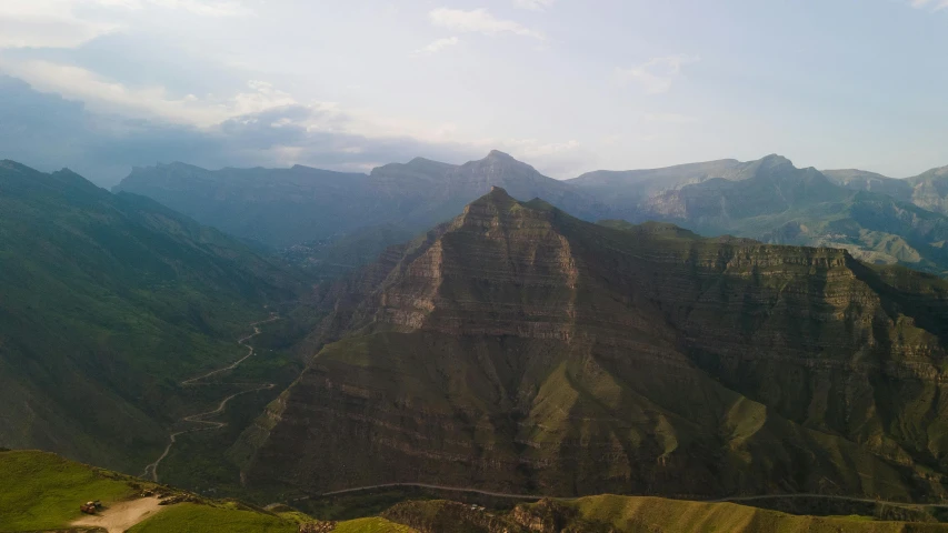 a view of the mountains from the top of a mountain, pexels contest winner, les nabis, erosion algorithm landscape, coban, kurdistan, aerial