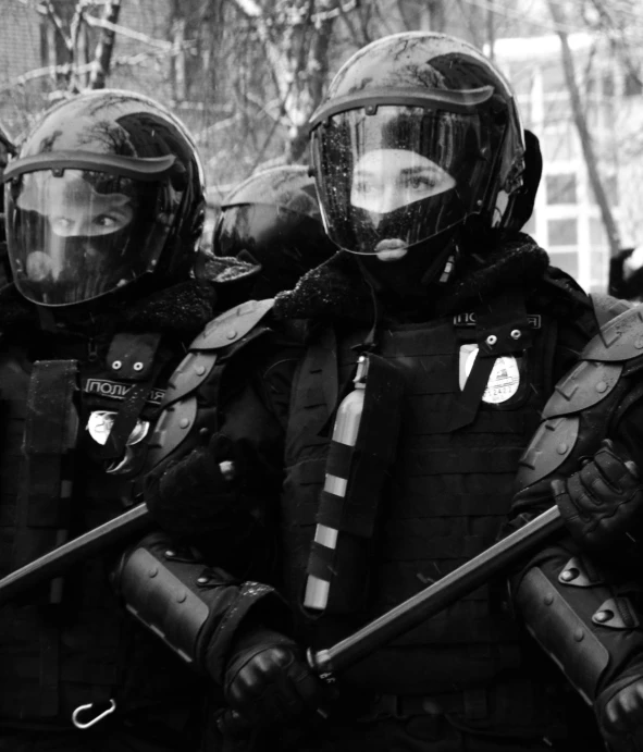 a group of police officers standing next to each other, a black and white photo, by Adam Marczyński, pexels, neoism, dressed in black body armour, russia in 2 0 2 1, 2263539546], kawaii swat team