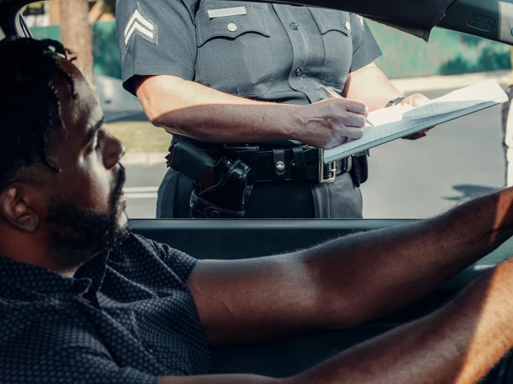 a police officer talking to a man in a car, pexels contest winner, renaissance, holding a clipboard, man is with black skin, holding court, flattened