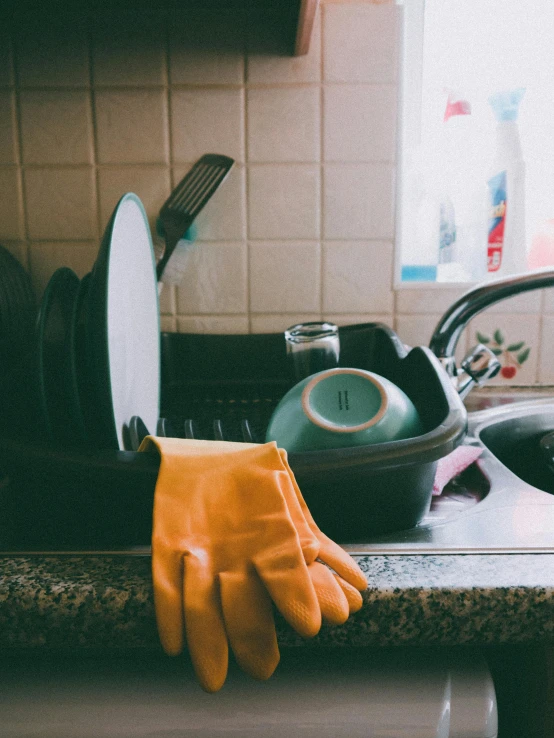 a kitchen sink filled with pots and pans, inspired by Elsa Bleda, pexels, yellow latex gloves, thumbnail, instagram story, college