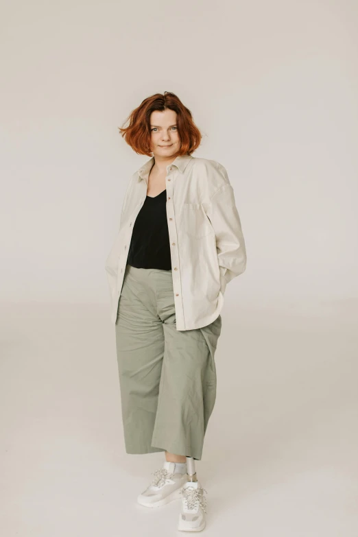 a woman in a white jacket and green pants, unsplash, renaissance, white backdrop, obese ), muted colors. ue 5, casual clothing