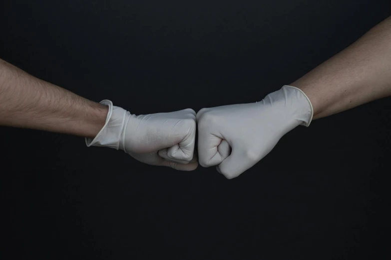 two hands in white gloves holding each other, by Adam Marczyński, pexels contest winner, plasticien, ready to fight, tubes, background image, two male