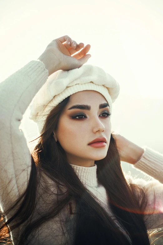 a woman with long hair wearing a white hat, inspired by Elsa Bleda, trending on pexels, pale-skinned persian girl, wearing sweater, heavy brow, beautiful south korean woman