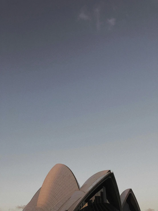 a view of the sydney opera house from across the water, an album cover, inspired by Ned M. Seidler, unsplash, brutalism, shoes, satellite dishes, minimalissimo, diptych