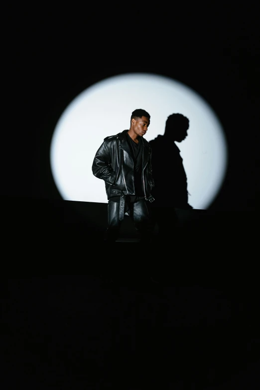 two men standing next to each other in the dark, an album cover, trending on pexels, digital art, portrait willow smith, in front of a big moon, wearing a leather trench coat, 15081959 21121991 01012000 4k