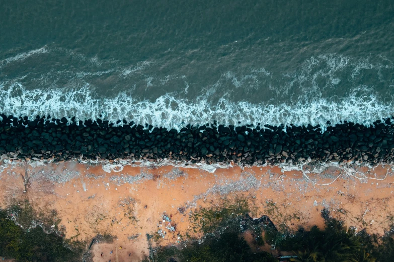 a large body of water next to a sandy beach, by Max Dauthendey, pexels contest winner, ocean pattern, sea line, thumbnail, half and half