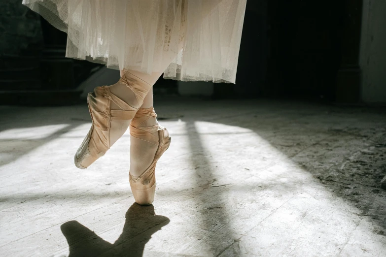 a close up of a person wearing ballet shoes, pexels contest winner, arabesque, light glare, unfinished, rectangle, cantered