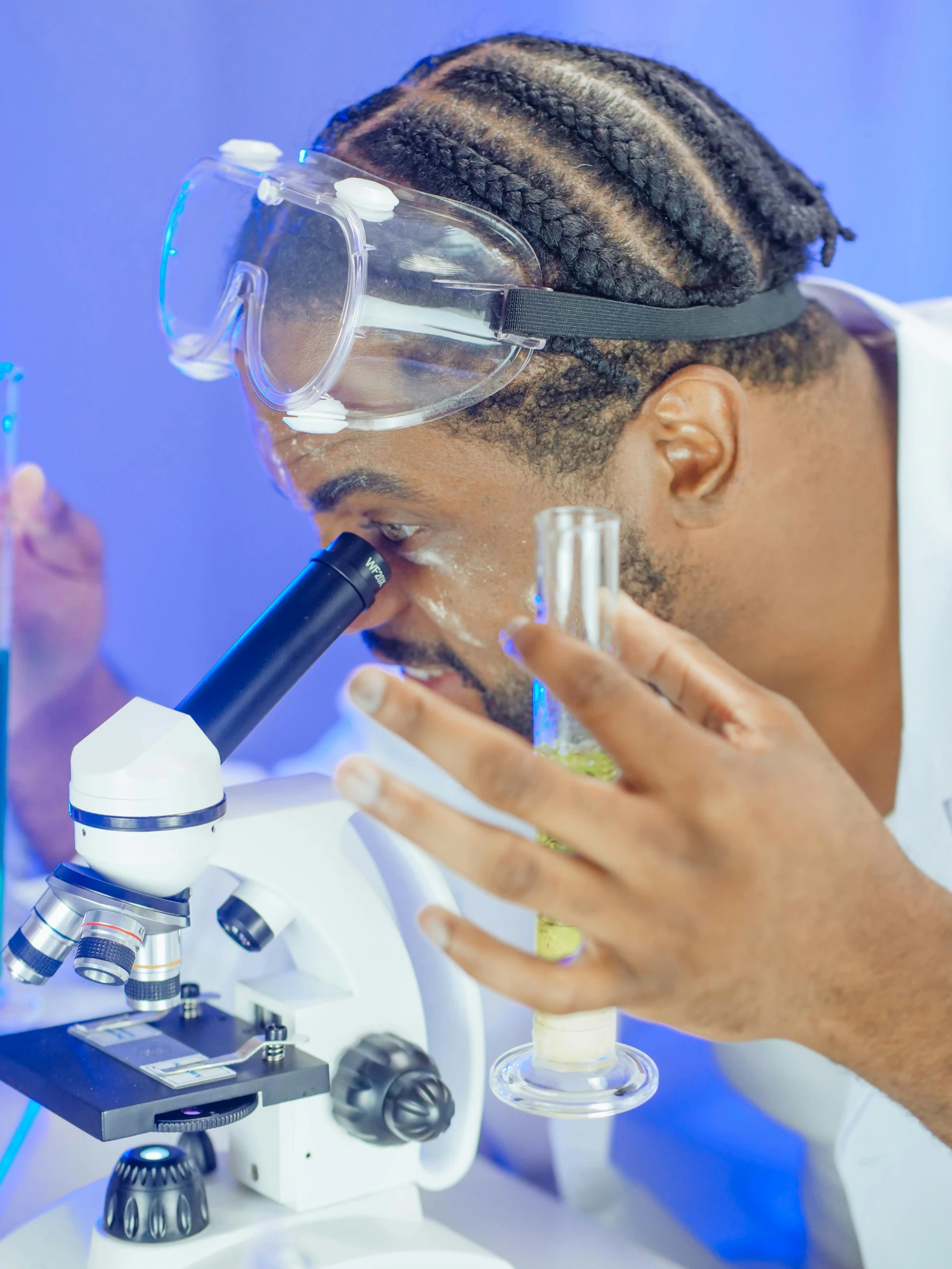 a man in a lab coat looking through a microscope, inspired by Dr. Atl, trending on pexels, smoking a magical bong, profile image, essence, official screenshot