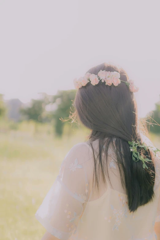 a couple of women standing next to each other in a field, unsplash, romanticism, roses in her hair, young asian woman, woman's profile, sunfaded