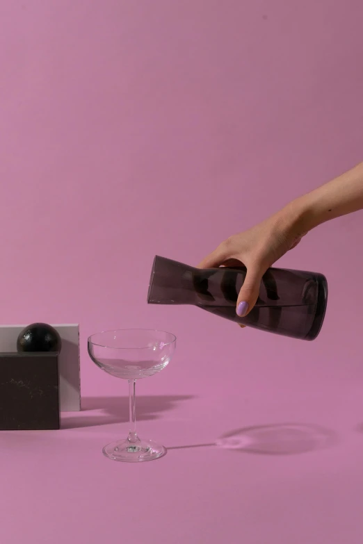 a bottle of wine being poured into a glass, inspired by Wilhelm Hammershøi, purism, large obsidian crystals, karim rashid, black main color, woman