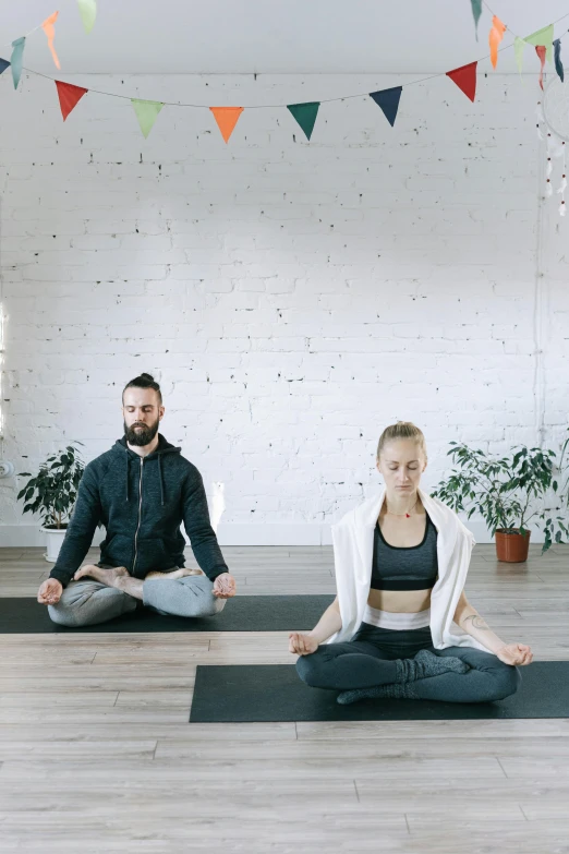 a man and a woman doing yoga together, trending on unsplash, light and space, low quality photo, ( ( theatrical ) ), promo image