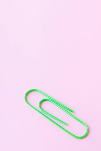 a green paper clip on a pink background, by Jessie Algie, trending on pexels, postminimalism, black fork, 15081959 21121991 01012000 4k, hot neon green ornaments, curves